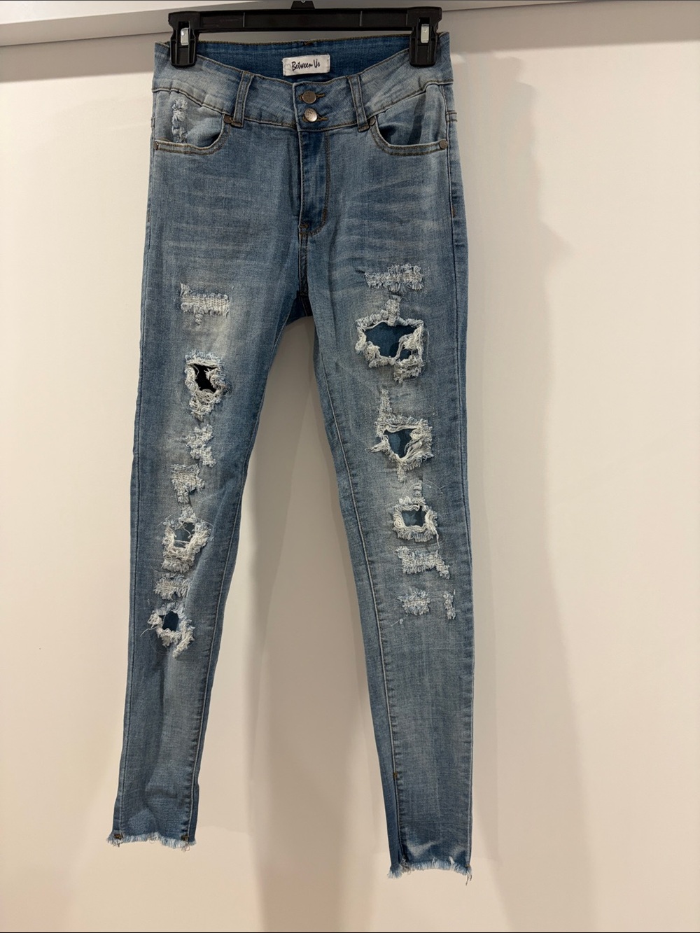 Blue Distressed Skinny Jeans with Raw Hem - Between Us